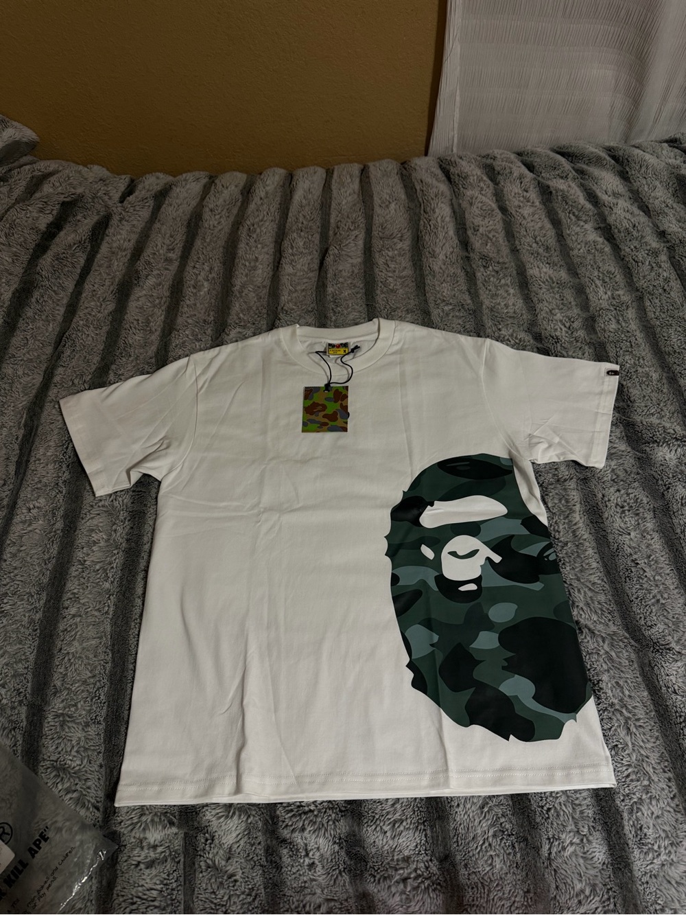Bape White Short Sleeve Tee with Green Camo Ape Head